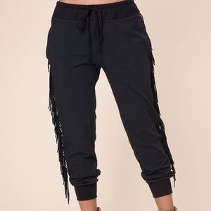 Kittenish black fringe joggers